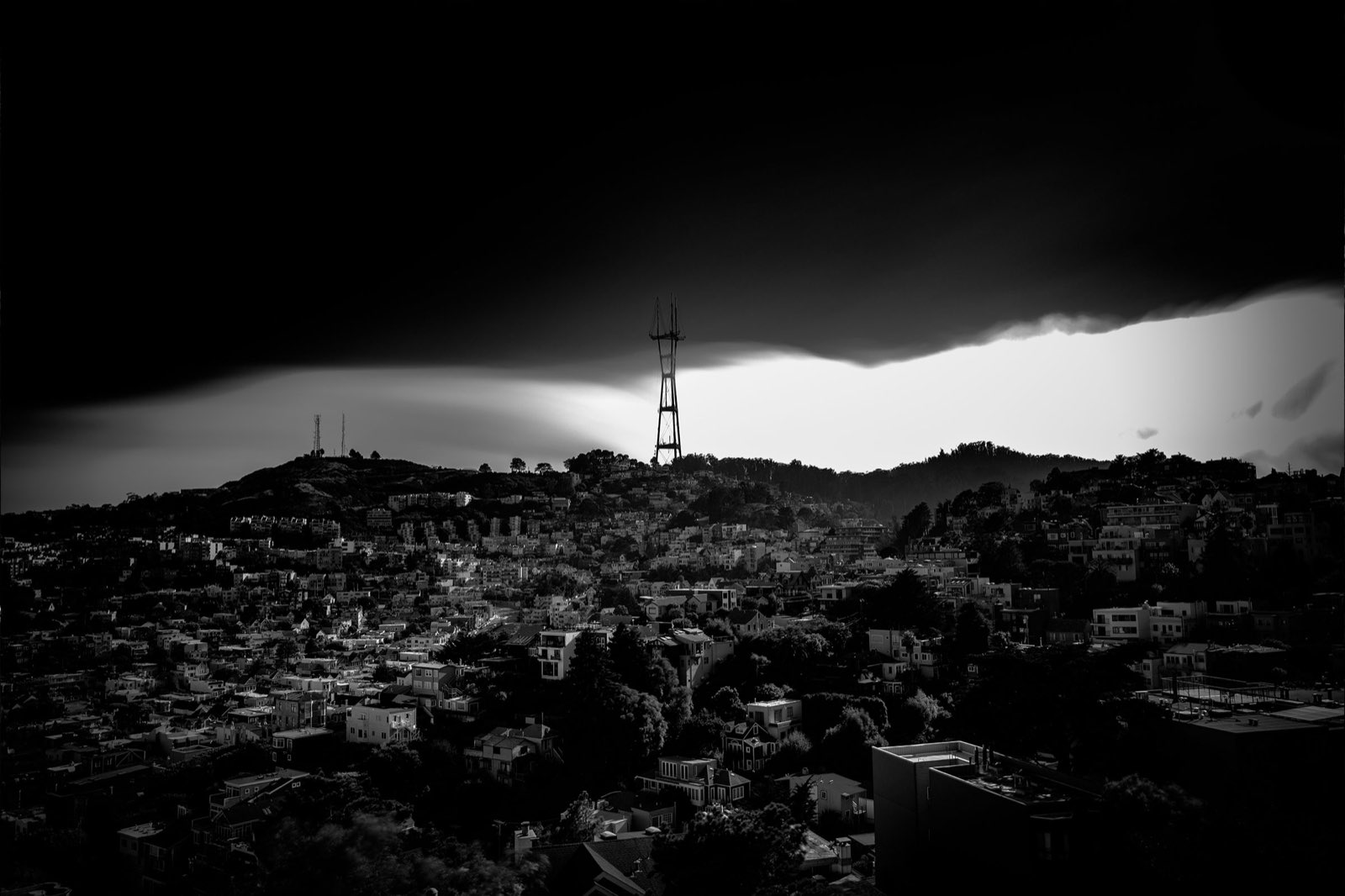 Sutro Tower rising above the San Francisco fog, in high-contrast black and white. From the Unintentionally Moody collection.